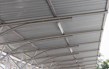 installing Mustow Green metal roofing